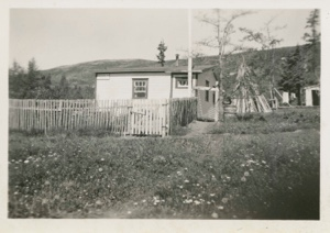 Image of Home with woodpile